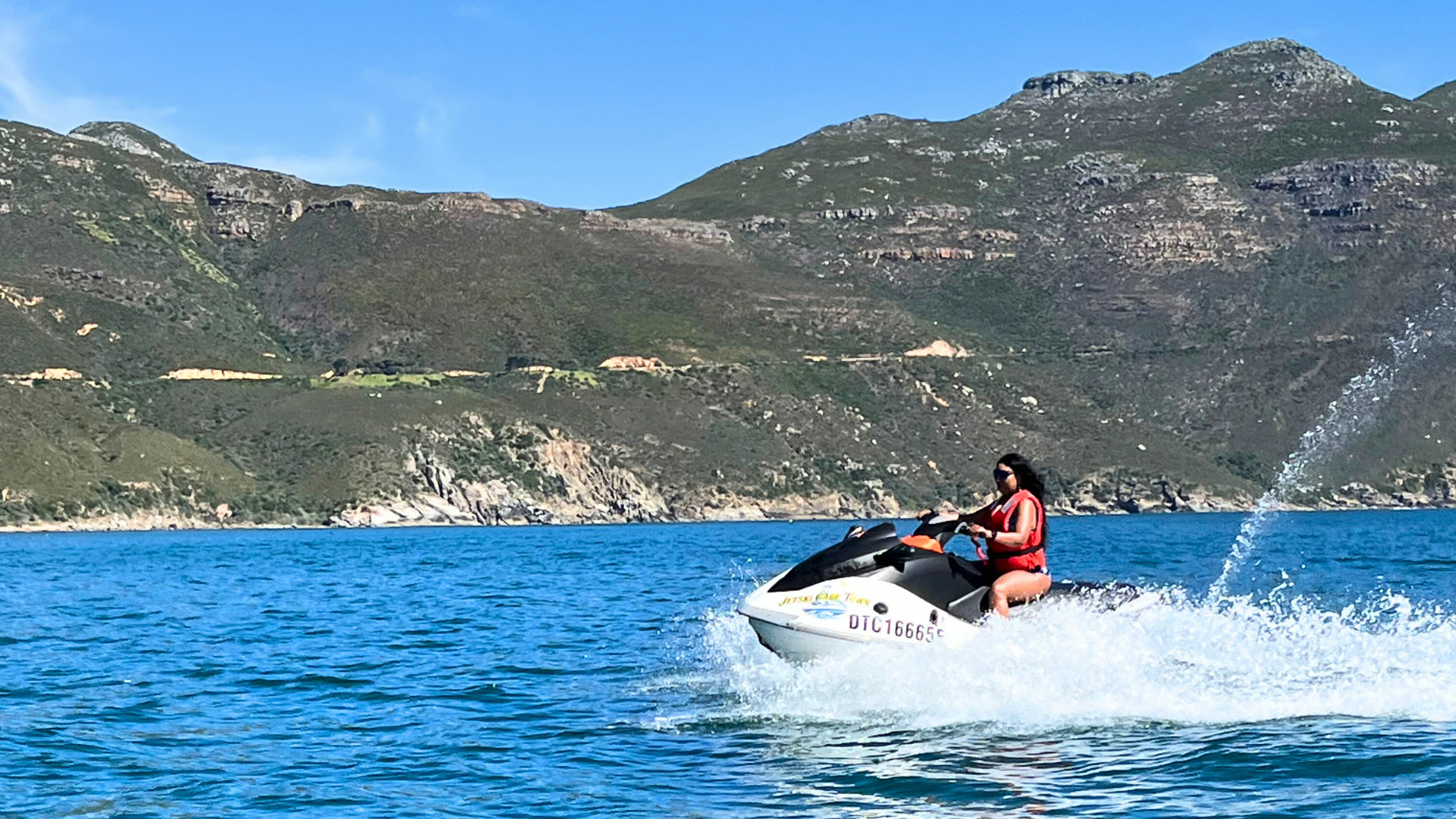 Jet ski tour heading toward Chapman's Peak from Hout Bay